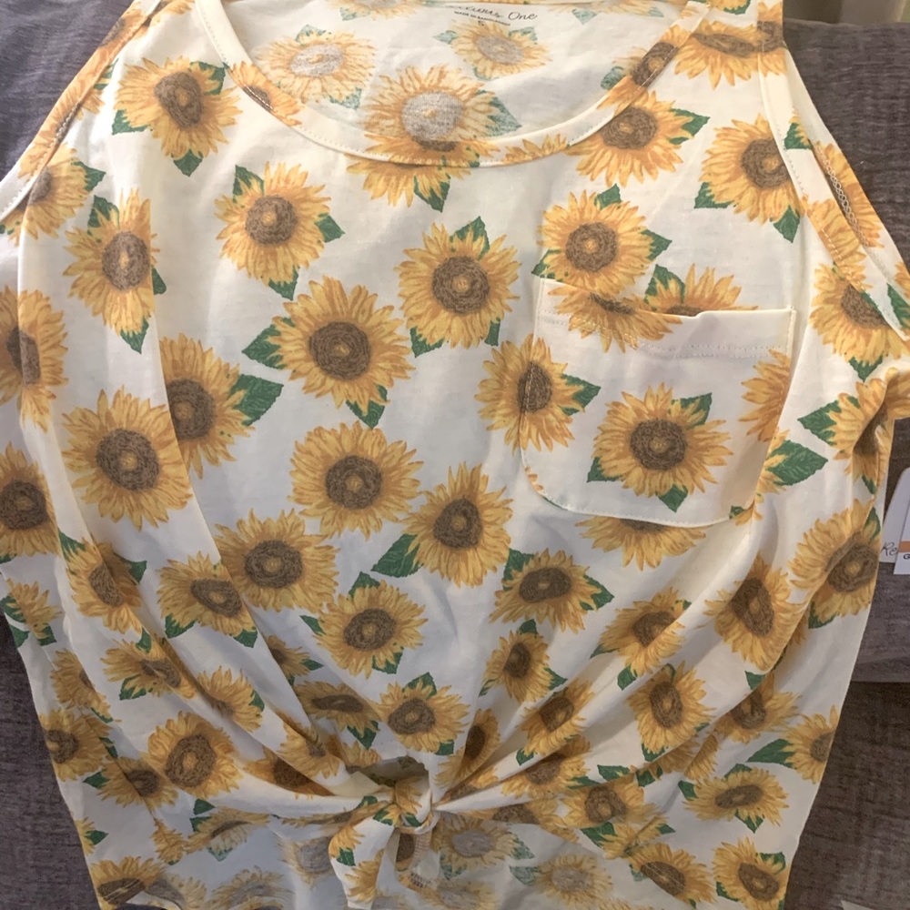 New. Rebellious One graphic tank. Juniors size small. Sunflower print